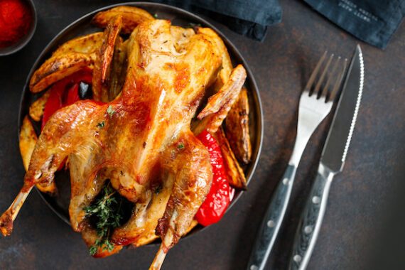 roasted guinea fowl with herbs and olive oil 2021 08 27 09 39 07 utc 570x380 - Pintade